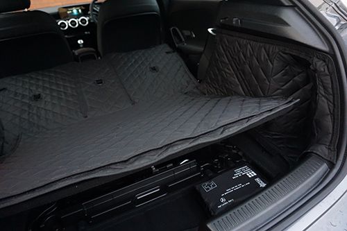 Boot liner with storage / spare wheel access